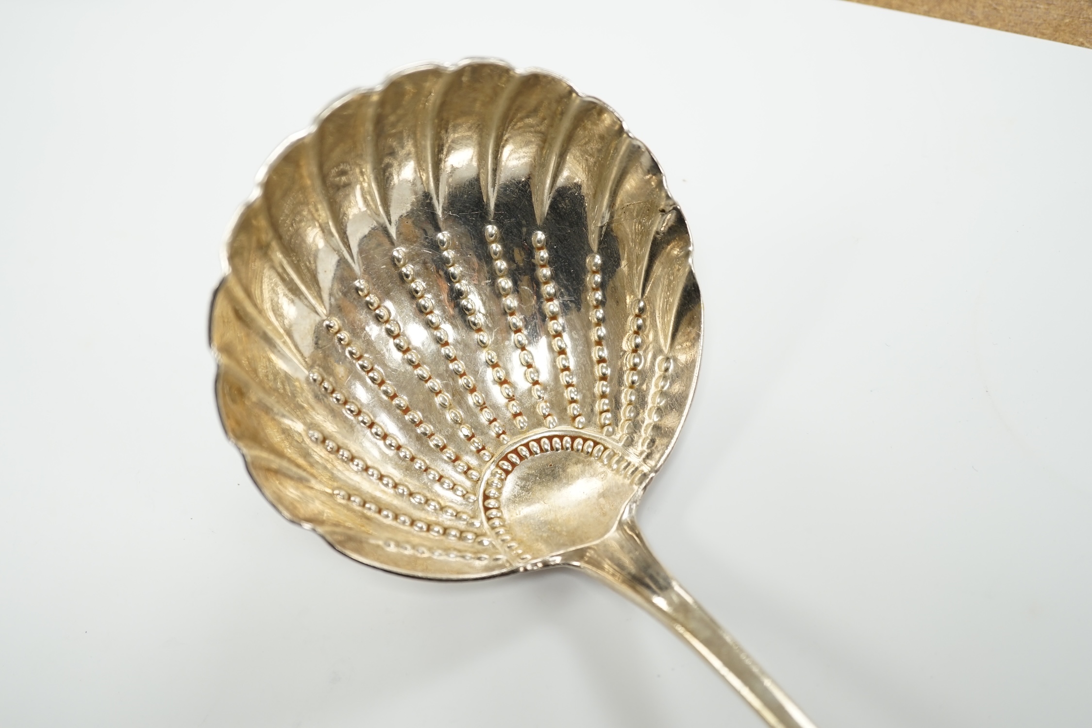 A George III Irish silver Old English pattern soup ladle, Michael Homer?, Dublin, 1775, 36cm, 7.1oz.